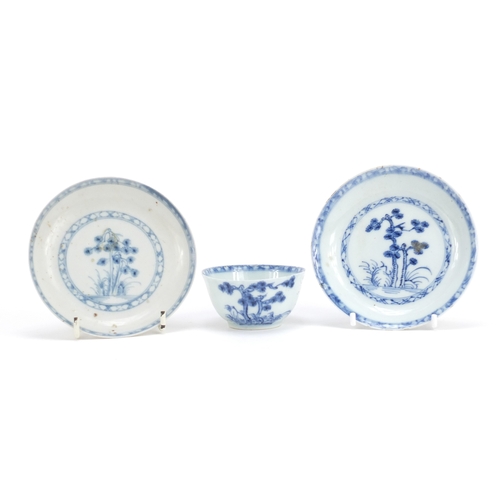 338 - Chinese Nanking Cargo blue and white porcelain comprising a tea bowl and two saucers, two with Chris... 