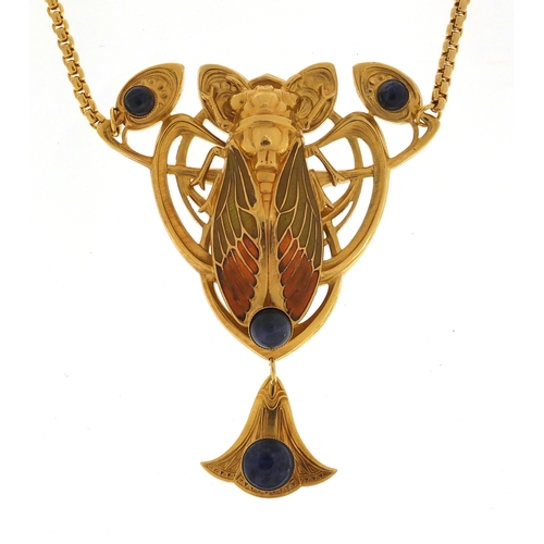 698 - Egyptian Revival gold coloured Cicadoidea pendant set with lapis lazuli stones, 40cm in length