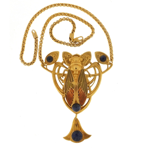 698 - Egyptian Revival gold coloured Cicadoidea pendant set with lapis lazuli stones, 40cm in length