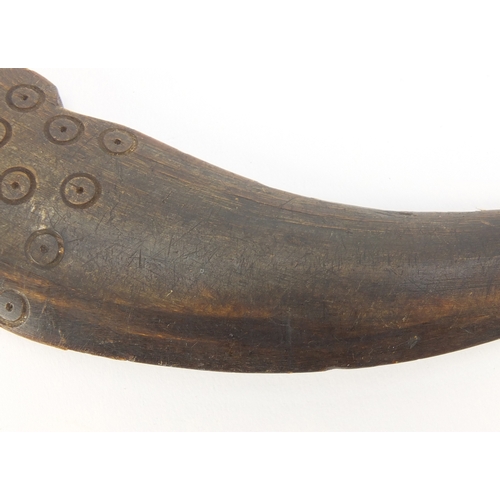 84 - Horn carving of a dagger, possibly rhinoceros horn, 31cm in length, 131.0g