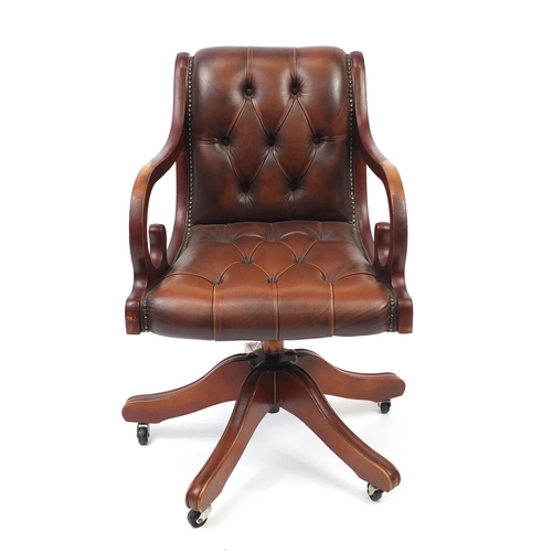 1 - Mahogany framed captains chair with brown leather button back upholstery, 80cm high