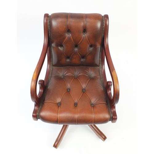 1 - Mahogany framed captains chair with brown leather button back upholstery, 80cm high