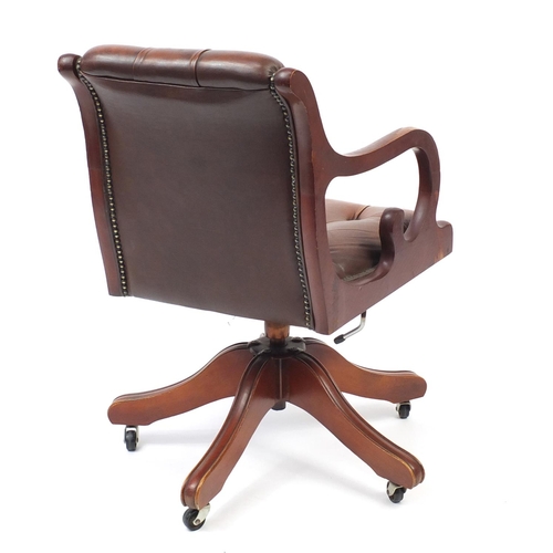 1 - Mahogany framed captains chair with brown leather button back upholstery, 80cm high