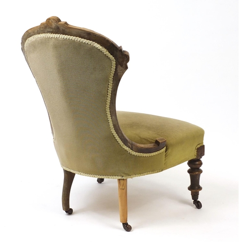 23 - Victorian walnut framed bedroom chair with green button back upholstery, 92.5cm high