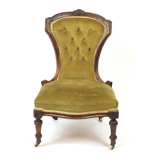 24 - Victorian walnut framed bedroom chair with green button back upholstery, 85cm high