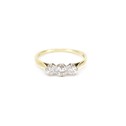 683 - 9ct gold diamond three stone ring, marked Bravington's to the band, size R, 1.9g