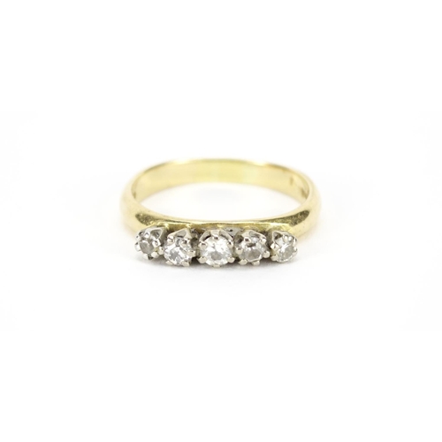 689 - 18ct gold diamond five stone ring, size T, 5.3g