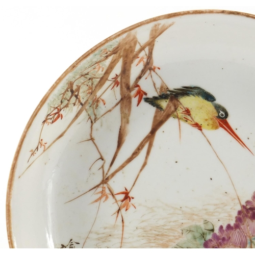 319 - Chinese porcelain shallow dish, hand painted in the famille rose palette with a kingfisher beside fl... 