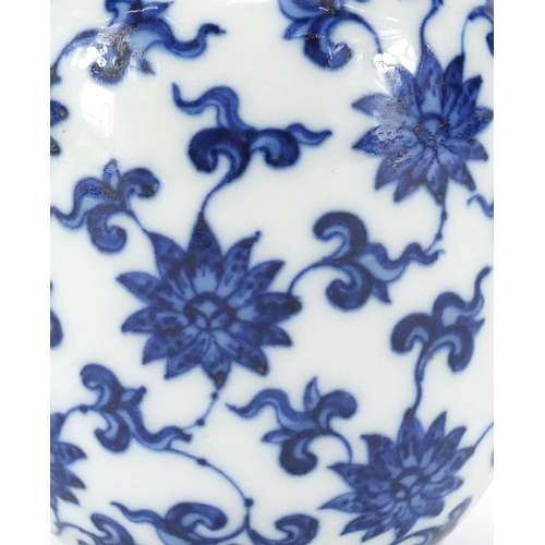 320 - Chinese blue and white porcelain vase, finely hand painted with flower heads and foliage, six figure... 