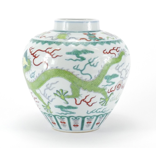 326 - Chinese porcelain Wucai vase, hand painted with two dragons chasing the flaming pearl amongst clouds... 