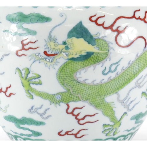 326 - Chinese porcelain Wucai vase, hand painted with two dragons chasing the flaming pearl amongst clouds... 