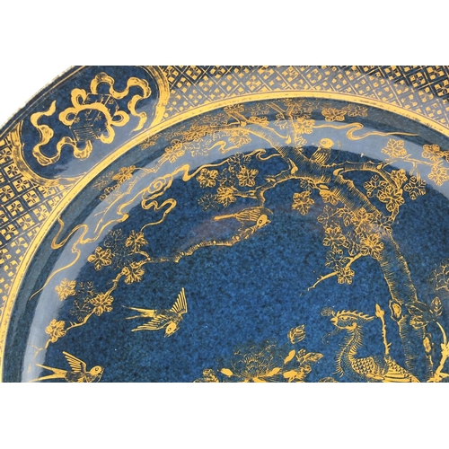 328 - Chinese porcelain charger, gilt decorated with phoenixes beside ducks with birds, blue ring marks to... 