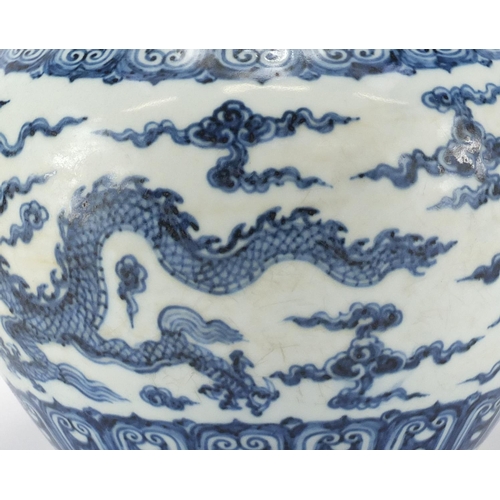 330 - Chinese blue and white porcelain jar, hand painted with dragons amongst clouds within rui head borde... 