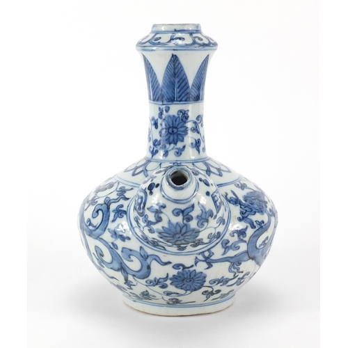 357 - Chinese blue and white porcelain Kendi, hand painted with two dragons amongst flower and foliage, 22... 