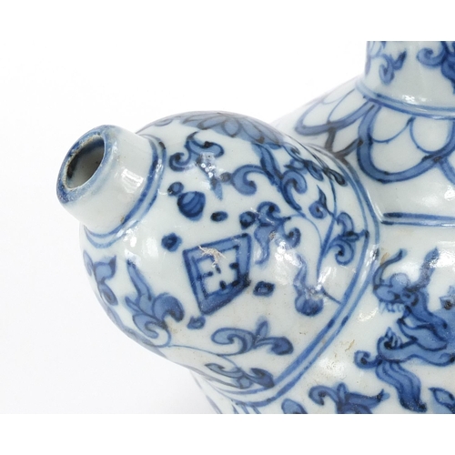 357 - Chinese blue and white porcelain Kendi, hand painted with two dragons amongst flower and foliage, 22... 