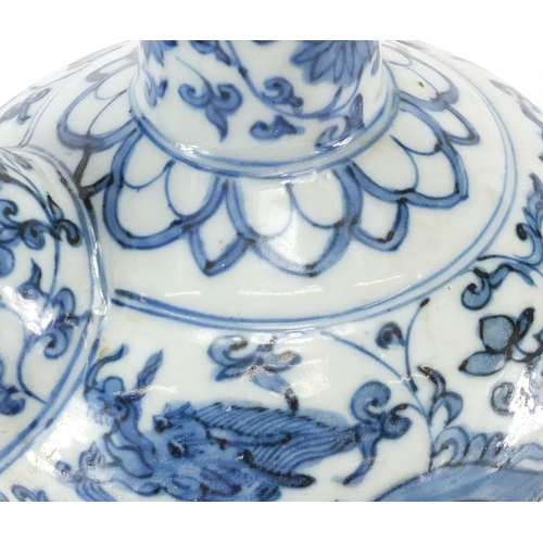 357 - Chinese blue and white porcelain Kendi, hand painted with two dragons amongst flower and foliage, 22... 