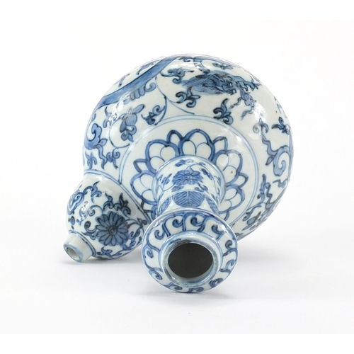 357 - Chinese blue and white porcelain Kendi, hand painted with two dragons amongst flower and foliage, 22... 