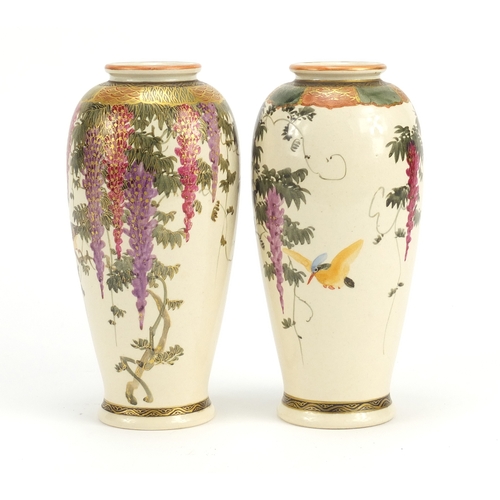 391 - Pair of Japanese Satsuma pottery vases hand painted with birds of paradise amongst wisteria, charact... 