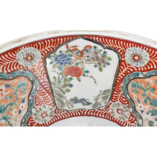 394 - Large Japanese Arita porcelain bowl, hand painted with panels of flowers, 37cm in diameter