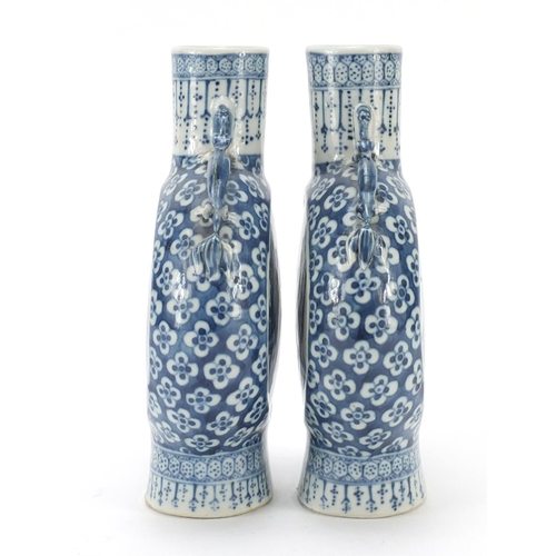 313 - Pair of Chinese blue and white porcelain moon flasks with twin handles, each hand painted with panel... 