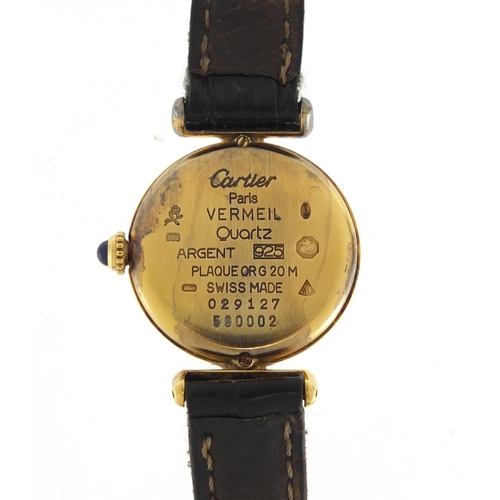 718 - Ladies silver gilt Must De Cartier Vermeil wristwatch with box and paperwork, numbered 029127 580002... 