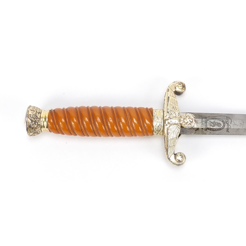 267 - German Military interest Army Officers dagger with scabbard by Waffen, 40.5cm in length