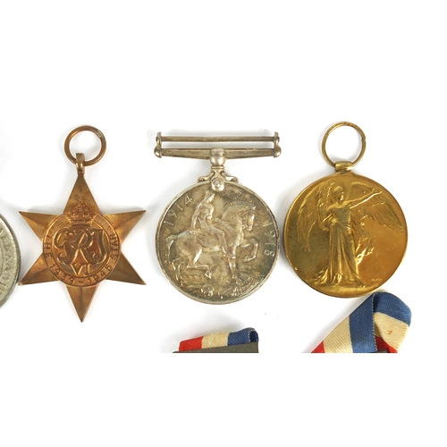 212 - British Military World War I and World War II medal group including a pair awarded to 15526PTE.F.J.F... 