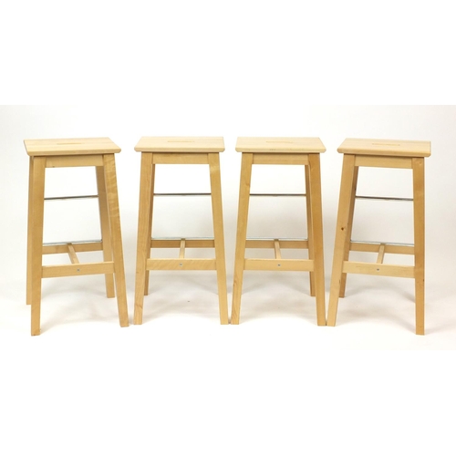 2028 - Set of four Ikea Bosse light wood breakfast stools, 74cm high