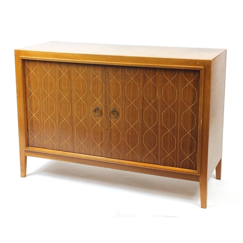 2025 - Gordon Russell Helix two door sideboard with Russell of Broadway label to the back, 84cm H x 122cm W... 