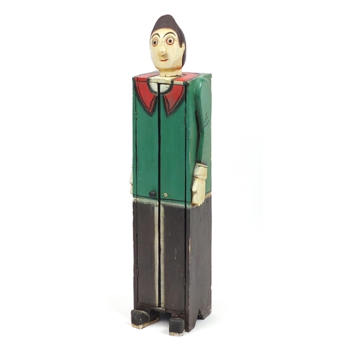 2047 - Novelty carved wood two door cupboard in the form of a man in a green coat, 106cm high