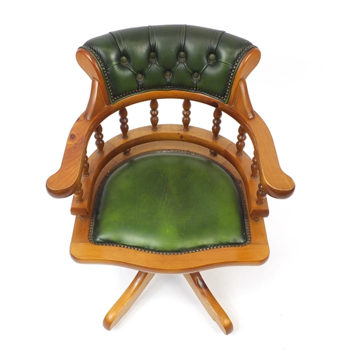 2030 - Pine captains chair with green leather button back upholstery, 77cm high
