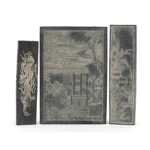 390 - Three Chinese ink stones including one carved with two young girls in a palace, the largest 11.5cm x... 