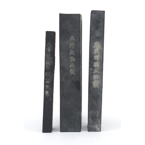 390 - Three Chinese ink stones including one carved with two young girls in a palace, the largest 11.5cm x... 