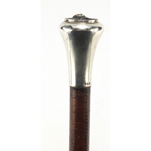 300 - Military interest swagger stick with silver pommel and Egyptian bust, 64.5cm in length