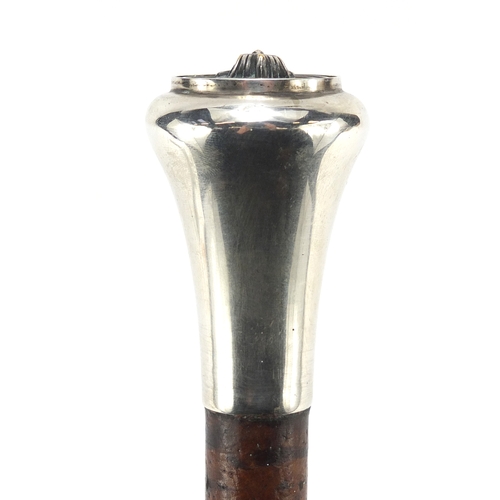 300 - Military interest swagger stick with silver pommel and Egyptian bust, 64.5cm in length