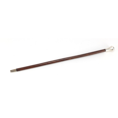 300 - Military interest swagger stick with silver pommel and Egyptian bust, 64.5cm in length