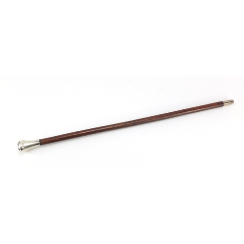 300 - Military interest swagger stick with silver pommel and Egyptian bust, 64.5cm in length