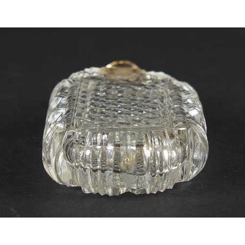 87 - Victorian cut glass scent bottle with unmarked gold lid, 7.5cm high