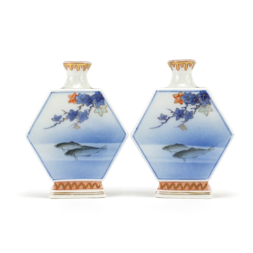 392 - Pair of Japanese Fukagawa porcelain vases with hexagonal bodies hand painted with fish and flowers, ... 