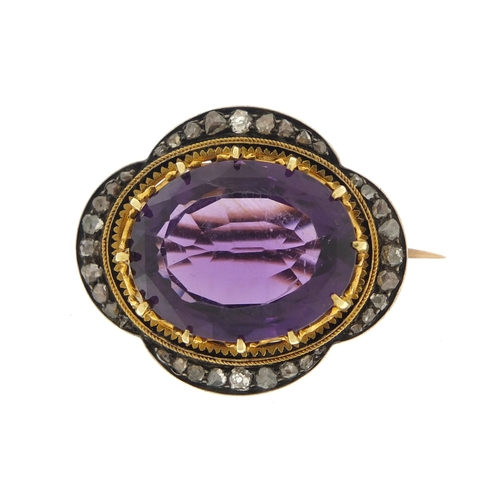 645 - Unmarked gold amethyst brooch with diamond and black enamel surround, 3cm in length, 10.9g