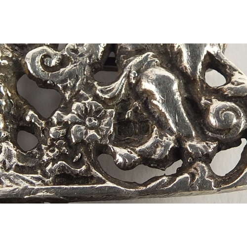 606 - Victorian style silver two piece nurses buckle embossed with putti, PJB London 1961, 10.5cm in lengt... 