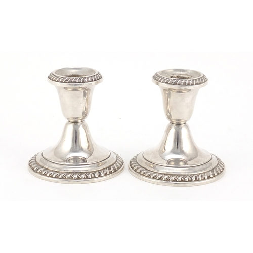 620 - Pair of American Gorham sterling silver candlesticks, 8.5cm high, 473.6g