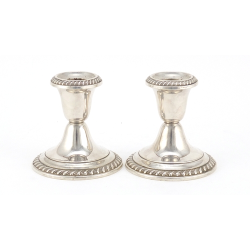 620 - Pair of American Gorham sterling silver candlesticks, 8.5cm high, 473.6g