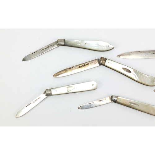 10 - Seven Georgian and later mother of pearl flanked silver bladed folding fruit knives, various hallmar... 