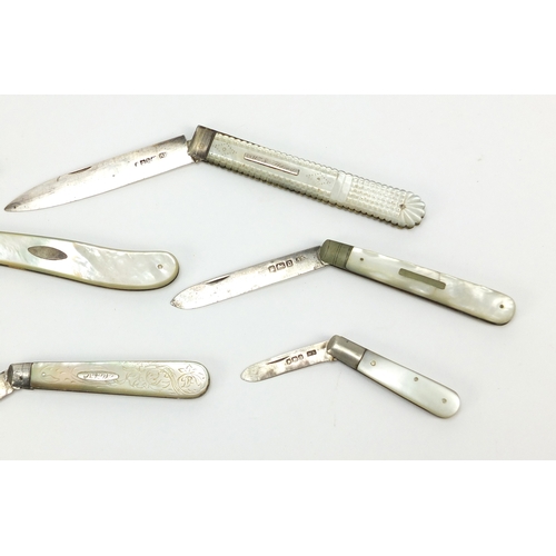 10 - Seven Georgian and later mother of pearl flanked silver bladed folding fruit knives, various hallmar... 