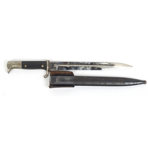 270 - German Military interest bayonet with scabbard, the steel blade engraved E Pack, 40.5cm in length