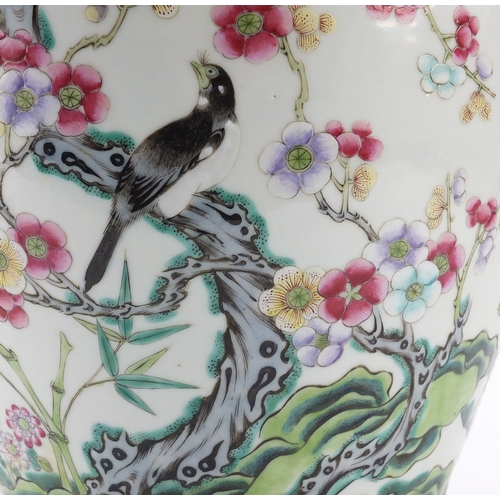 305a - Chinese porcelain vase with carved hardwood lid and stand, finely hand painted in the famille rose p... 