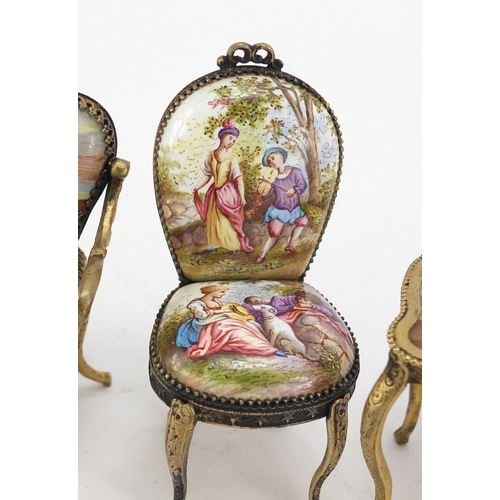 11a - 19th century enamel dolls house furniture with gilt metal mounts, probably french, comprising two se... 
