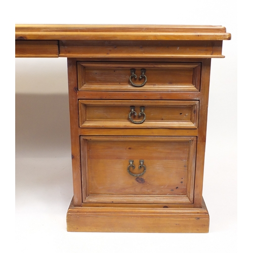 159 - Large pine twin pedestal desk fitted with seven drawers, Pine Of Time plaque to the back, 87cm H x 1... 