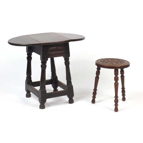 77 - Walnut three legged stool and a dropleaf table